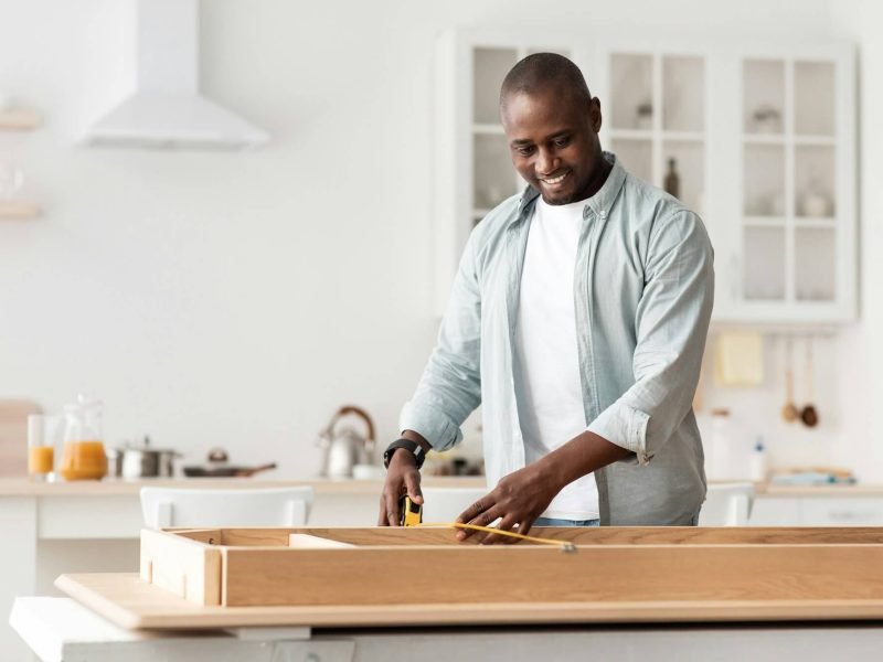 handyman-working-at-home-repairing-assembling-and-renovation-or-new-hobby-man-measuring-new-table.jpg handyman-working-at-home-repairing-assembling-and-renovation-or-new-hobby-man-measuring-new-table.jpg